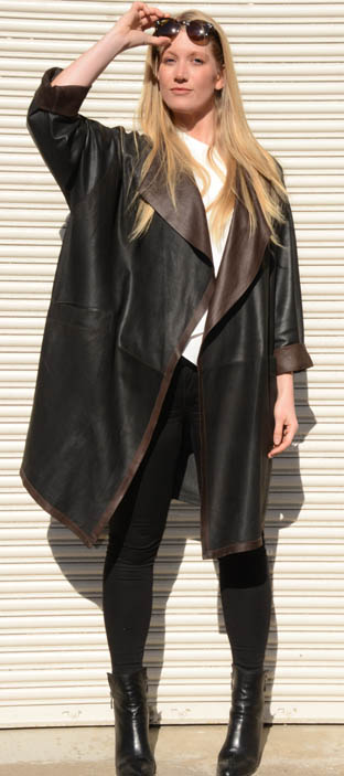 model in leather coat and sunglasses model in black leather coat and sunglasses