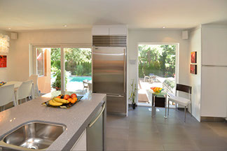 kitchen interior with pool outdoors