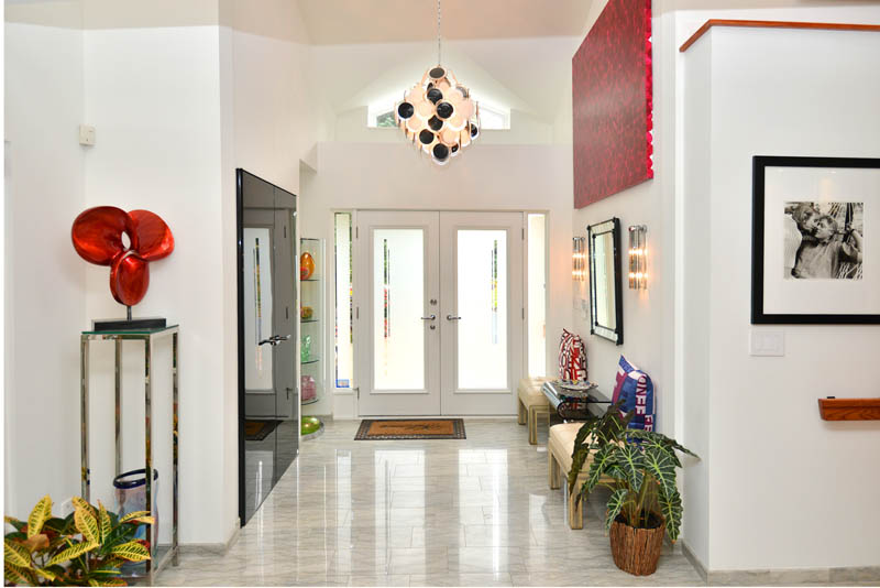 foyer with marble and art