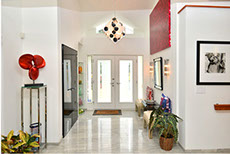 foyer with marble and art