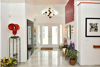 foyer with marble and art