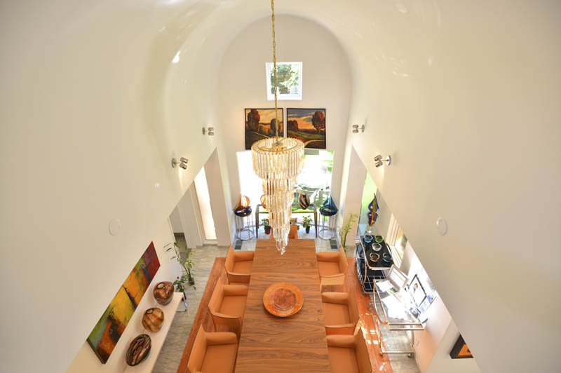dining room, art and chandelier from balcony 