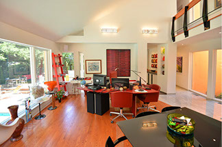 office by pool with balcony above