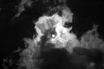 Sun in pond water in B&W 