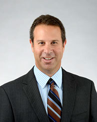 portrait of a man in striped tie