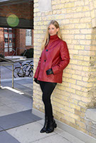 model wearing red leather coat