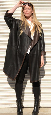 model in black leather coat and sunglasses